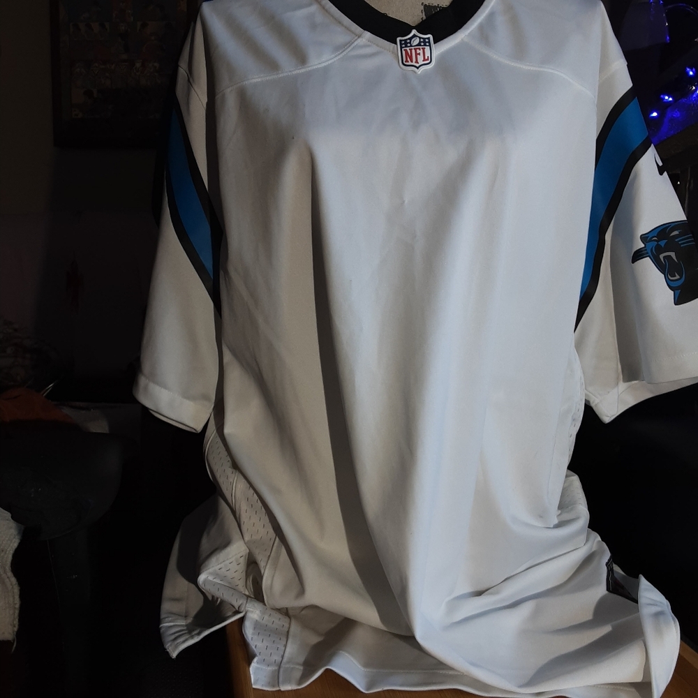 Men's XL Nike Carolina Panthers jersey in white and blue colors.